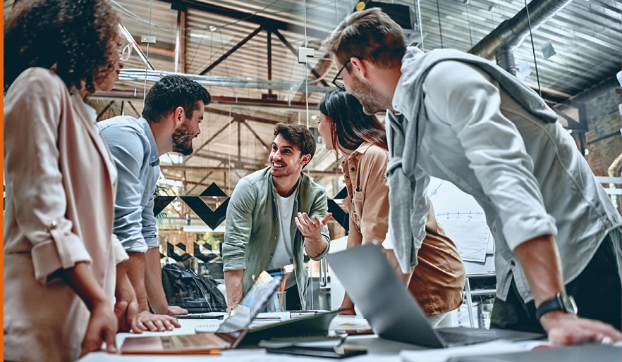 Group of young multiracial business people are working in modern office  Freelancers in coworking place  Creative and stylish youth 