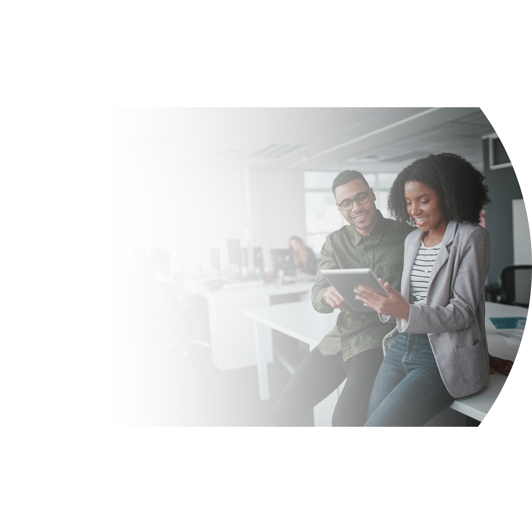 Successful african american business couple talking and using digital tablet